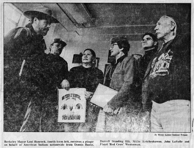 Loni receives an honor from Dennis Banks, Darrell Standing Crow, Millie Ketcheshawno,<br />
John La Velle, and Floyd 'Red Crow' Westerman. [SF Chronicle 3/7/92]<br />
